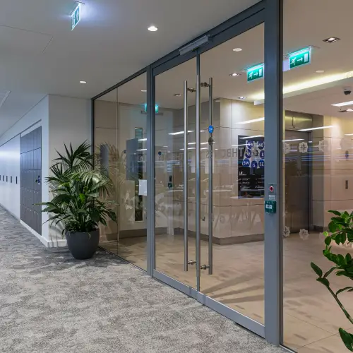 Fire rated glazed door with fire-resistant glass and durable frame for enhanced building safety