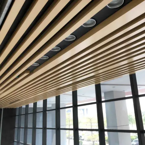 Linear metal ceiling system with horizontal panels for modern commercial interiors