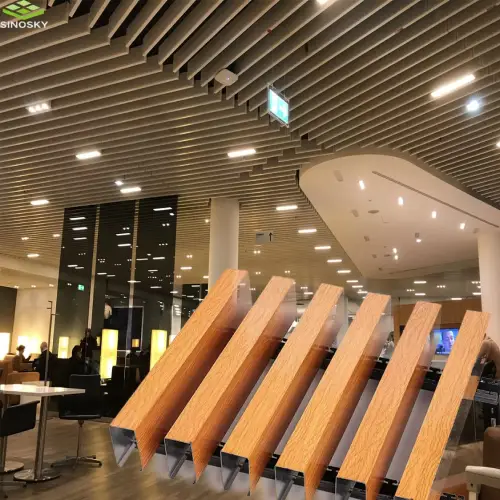 U-Baffle metal ceiling system with linear panels for modern commercial interiors
