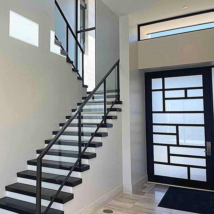 Glass balustrade and stainless steel handrail system for staircases and balconies